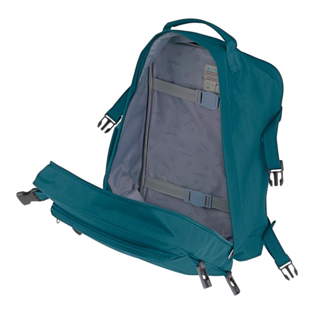 Interior abierto de la mochila Gabol Week turquesa con distribución organizada y compartimento para portátil de hasta 14 pulgadas.