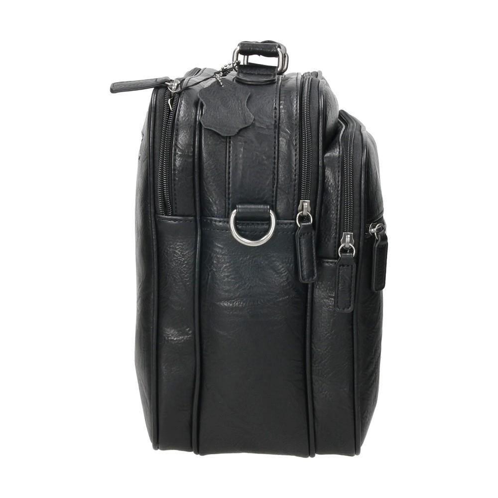 Detalle del lateral del bolso Matties Nappa con anclajes metálicos para la bandolera regulable y estructura resistente para un uso intensivo.