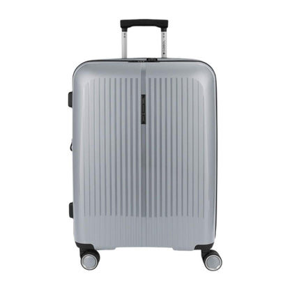 Vista frontal de la maleta mediana Gabol Brooklyn en color plata, fabricada en polipropileno de alta resistencia con cuatro ruedas dobles multidirección, ideal para viajes de 5 a 7 días.