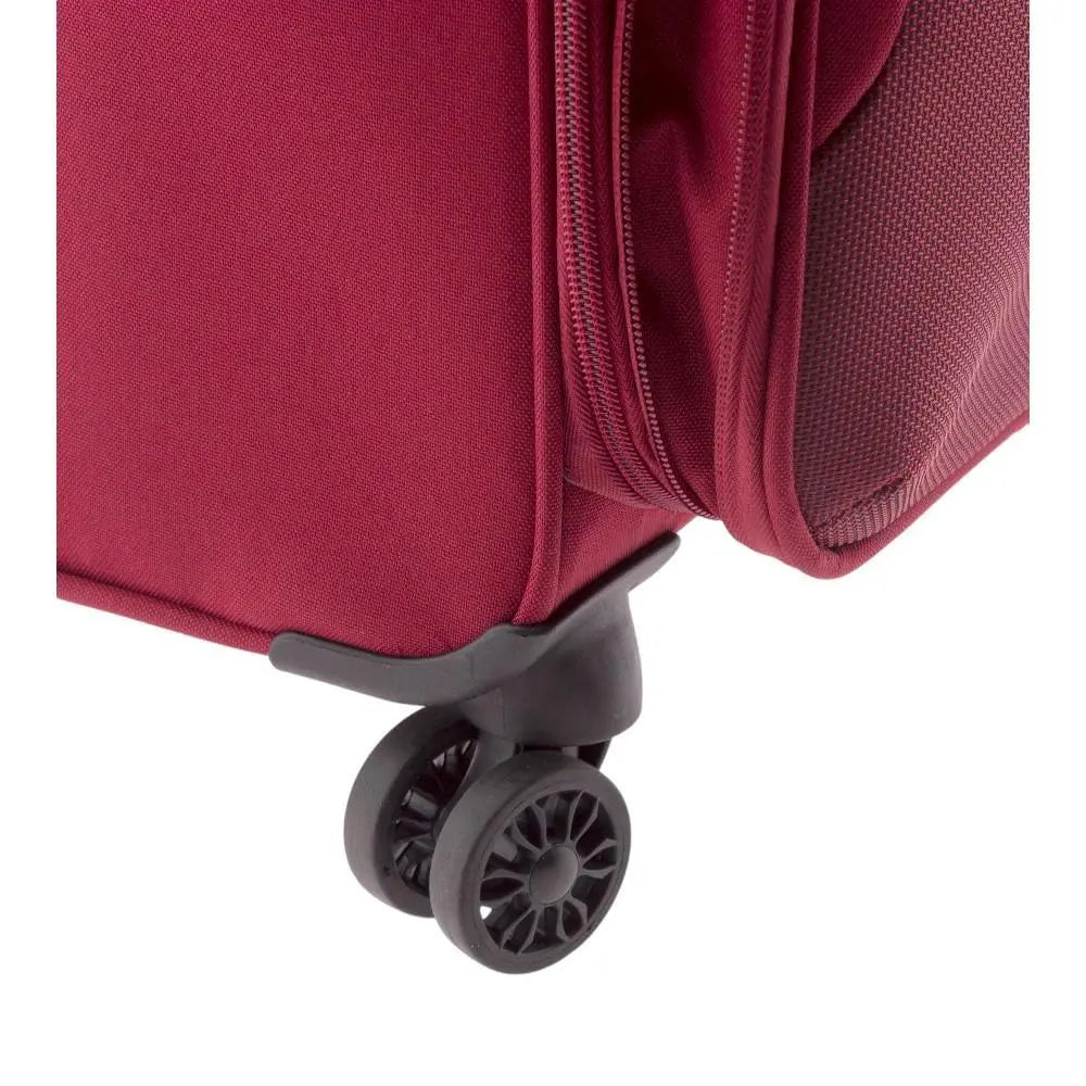 Detalle de la parte inferior mostrando una de las resistentes ruedas dobles que permiten un giro de 360 grados para un transporte cómodo.