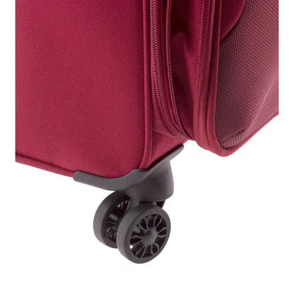 Detalle de la parte inferior mostrando una de las resistentes ruedas dobles que permiten un giro de 360 grados para un transporte cómodo.