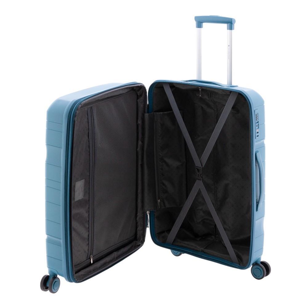 Vista completa de los compartimentos interiores de la maleta mediana Boxing con cintas elásticas de sujeción.