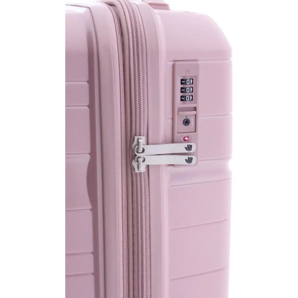 Detalle del candado TSA de combinación numérica integrado en la maleta Boxing rosa.