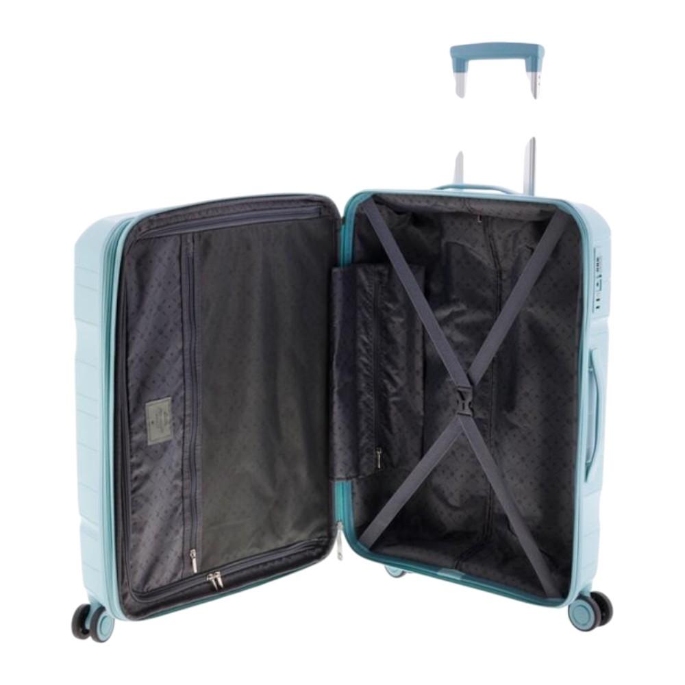 Interior de la maleta mediana Boxing con forro de calidad, bolsillos de red y cintas de sujeción para equipaje.