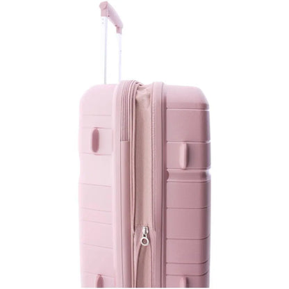 Vista del lateral con tacos de apoyo para proteger la carcasa de la maleta rosa al posarla en el suelo.