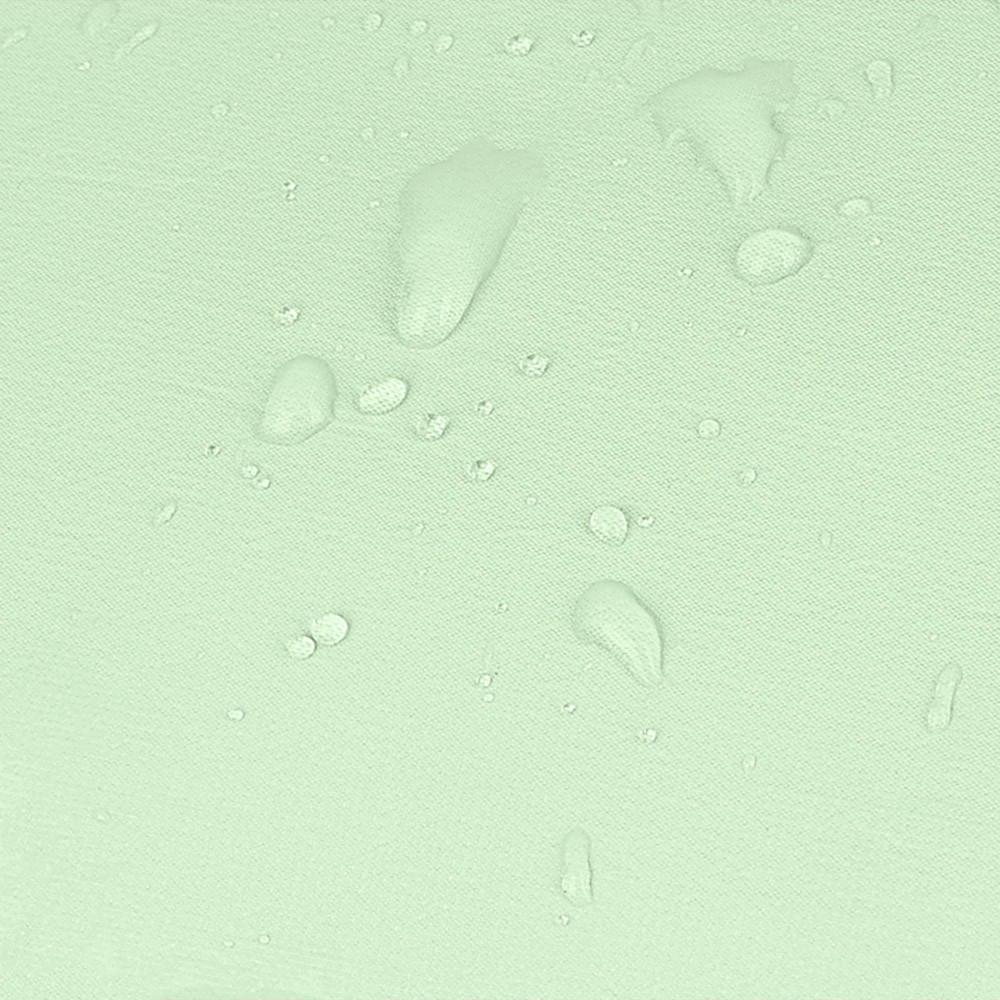Detalle del tejido de poliéster resistente al agua en color verde agua de la mochila Luisipo Gabol Vancouver