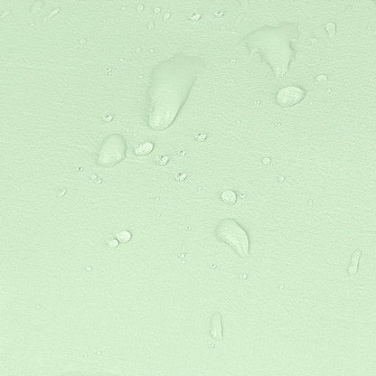 Detalle del tejido de poliéster resistente al agua en color verde agua de la mochila Luisipo Gabol Vancouver